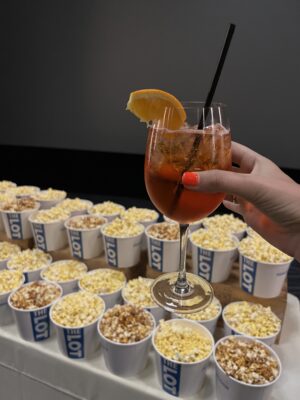 Photo of aperol spritz and popcorn